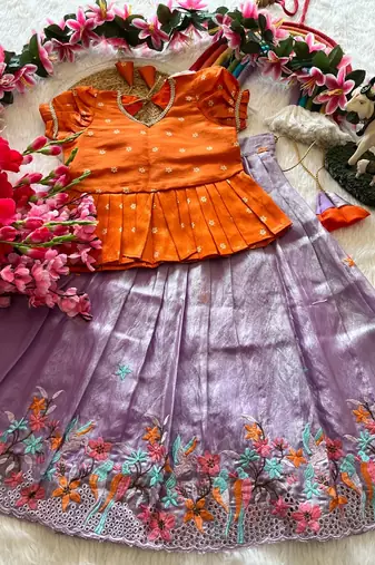 Girls orange tissue silk choli with lavender floral embroidered lehenga set