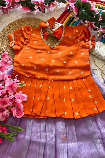 Girls orange tissue silk choli with lavender floral embroidered lehenga set
