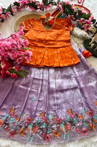 Girls orange tissue silk choli with lavender floral embroidered lehenga set
