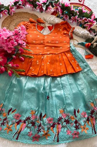Girls orange tissue silk choli with skyblue floral embroidered lehenga set