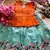 Girls orange tissue silk choli with skyblue floral embroidered lehenga set
