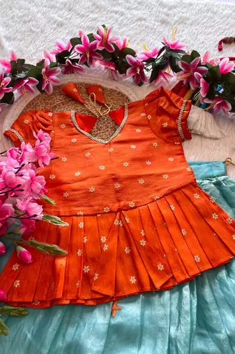 Girls orange tissue silk choli with skyblue floral embroidered lehenga set
