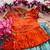 Girls orange tissue silk choli with skyblue floral embroidered lehenga set
