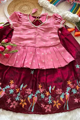 Girls pink tissue silk choli with ranipink floral embroidered lehenga set