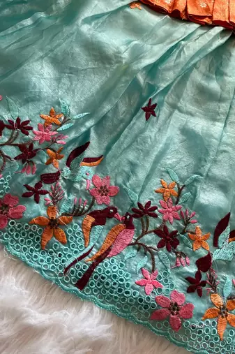 Girls orange tissue silk choli with skyblue floral embroidered lehenga set
