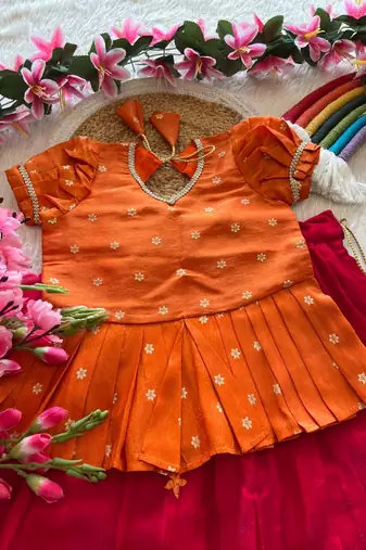 Girls orange tissue silk choli with pink floral embroidered lehenga pavadai set