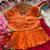 Girls orange tissue silk choli with pink floral embroidered lehenga pavadai set