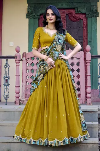 Mustard Vichitra Silk Sequins and Thread Embroidered With Kalamkari Print Border wedding lehenga Choli