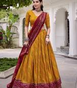 Glamorous Yellow Tasar Silk Bandhej Print With Gotta Patti Lace Touch Up Indian wedding lehenga Choli dress