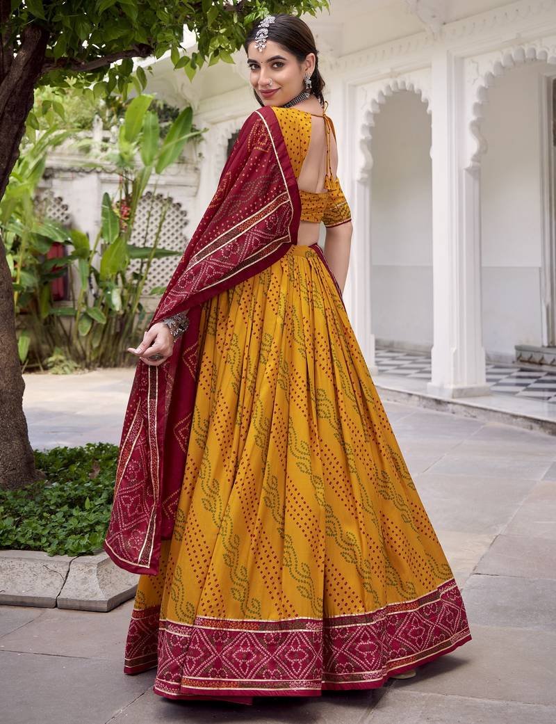 Glamorous Yellow Tasar Silk Bandhej Print With Gotta Patti Lace Touch Up Indian wedding lehenga Choli dress
