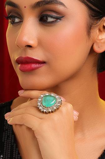 Gold plated kundan green stones ring