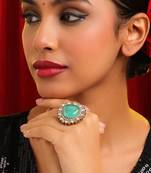 Gold plated kundan green stones ring