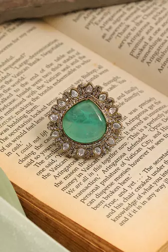 Gold plated kundan green stones ring
