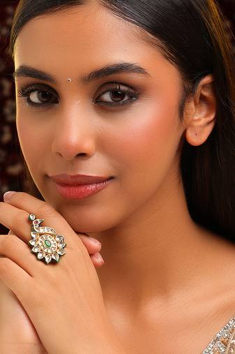 Gold plated kundan green stones ring
