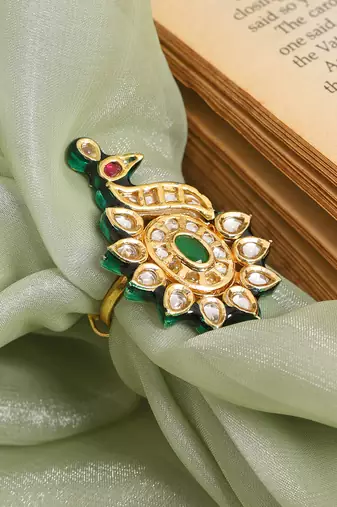 Gold plated kundan green stones ring