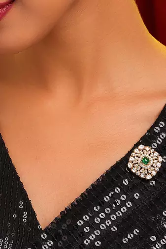 Gold plated kundan green stones brooch