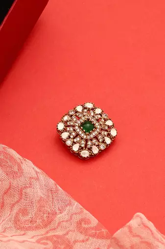 Gold plated kundan green stones brooch