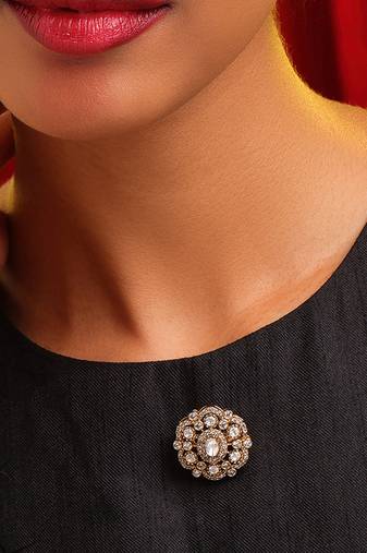 Gold plated kundan brooch