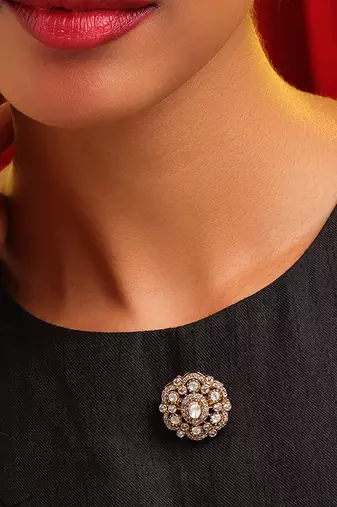 Gold plated kundan brooch
