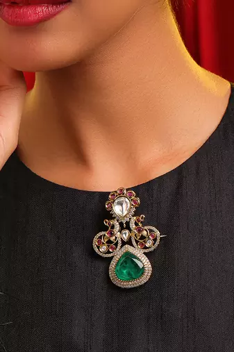 Gold plated kundan green stones brooch