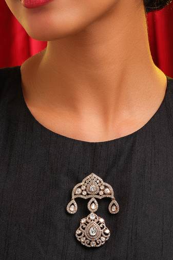 Gold plated kundan brooch