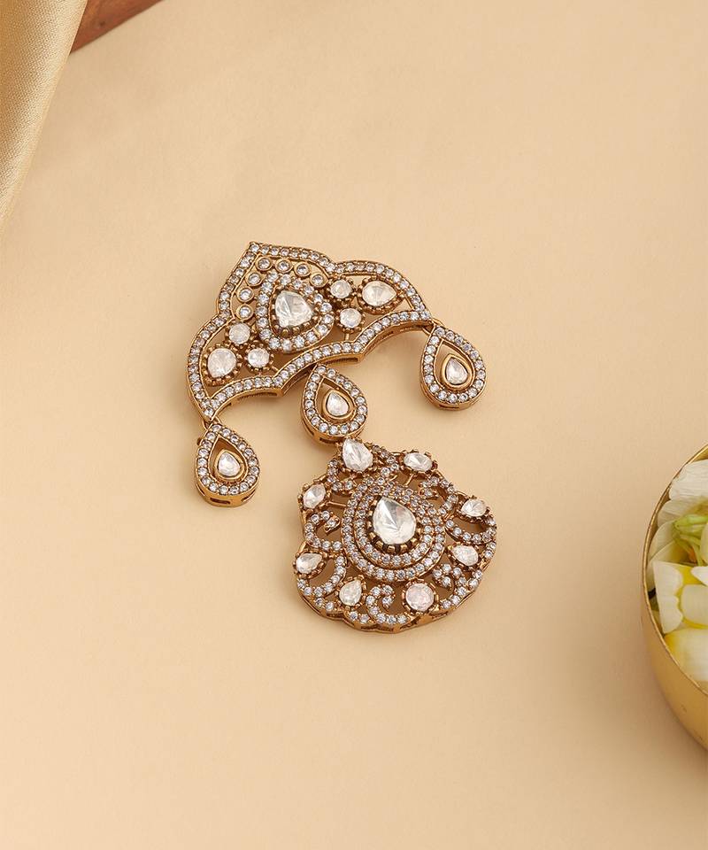 Gold plated kundan brooch