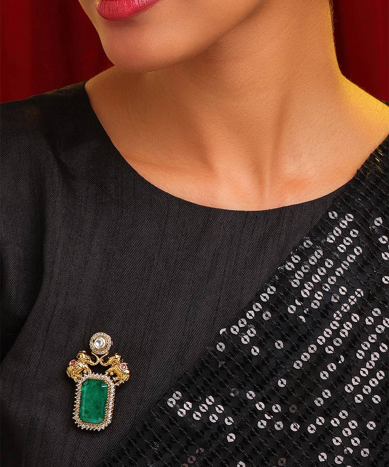 Gold plated kundan green stones brooch