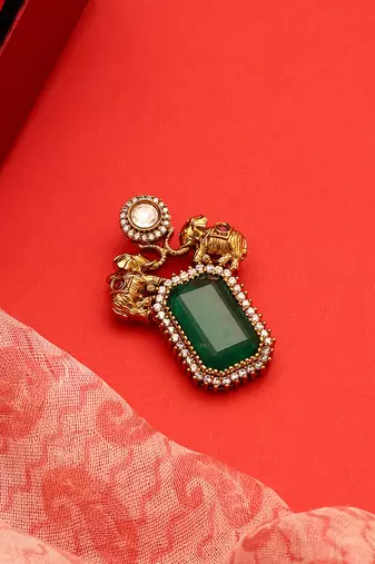 Gold plated kundan green stones brooch