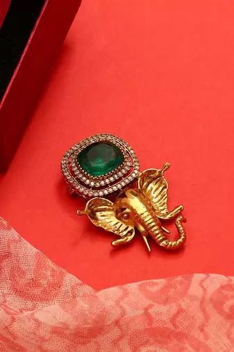 Gold plated kundan green stones brooch
