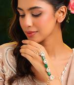 Gold plated kundan green stones haath phool