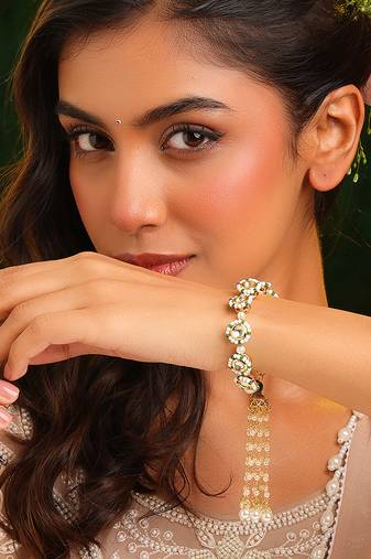 Gold plated kundan green stones bracelet