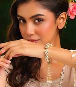 Gold plated kundan green stones bracelet