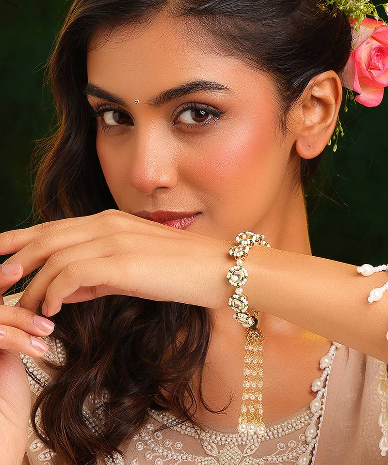 Gold plated kundan green stones bracelet