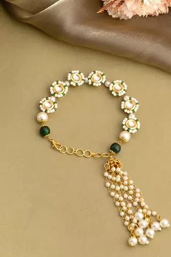 Gold plated kundan green stones bracelet