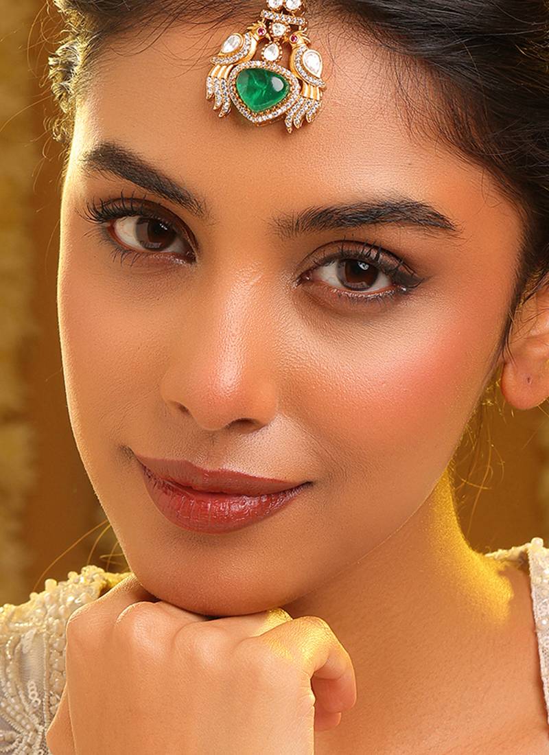 Gold plated kundan green stones maang tikka