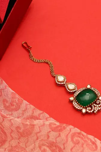 Gold plated kundan green stones maang tikka