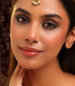 Gold plated kundan green stones maang tikka