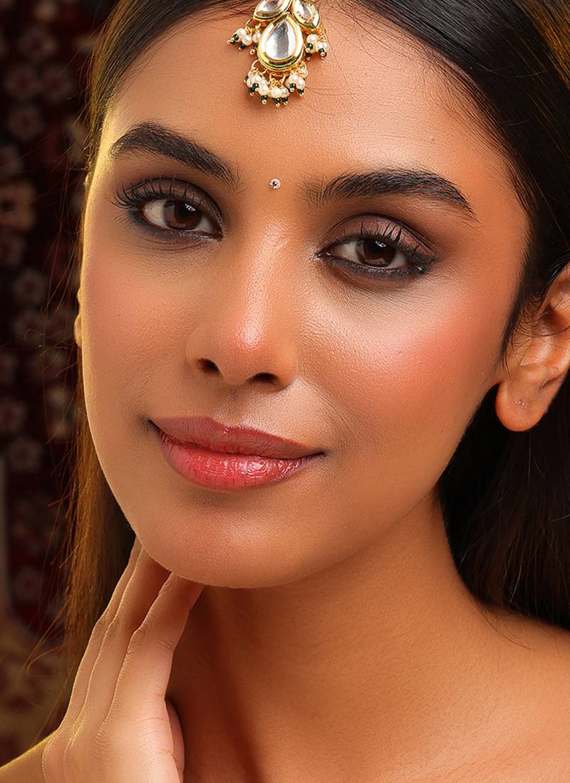 Gold plated kundan green stones maang tikka