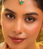 Gold plated kundan green stones maang tikka