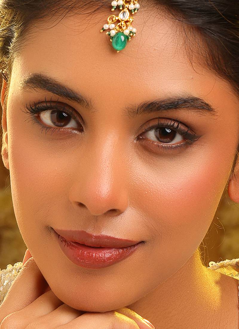 Gold plated kundan green stones maang tikka