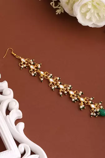 Gold plated kundan green stones maang tikka
