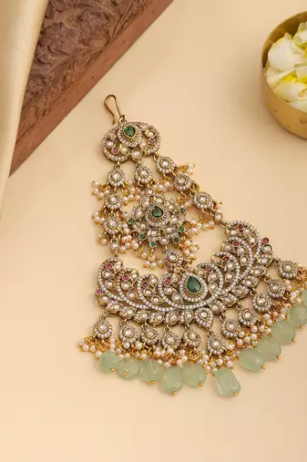 Gold plated kundan green stones passa
