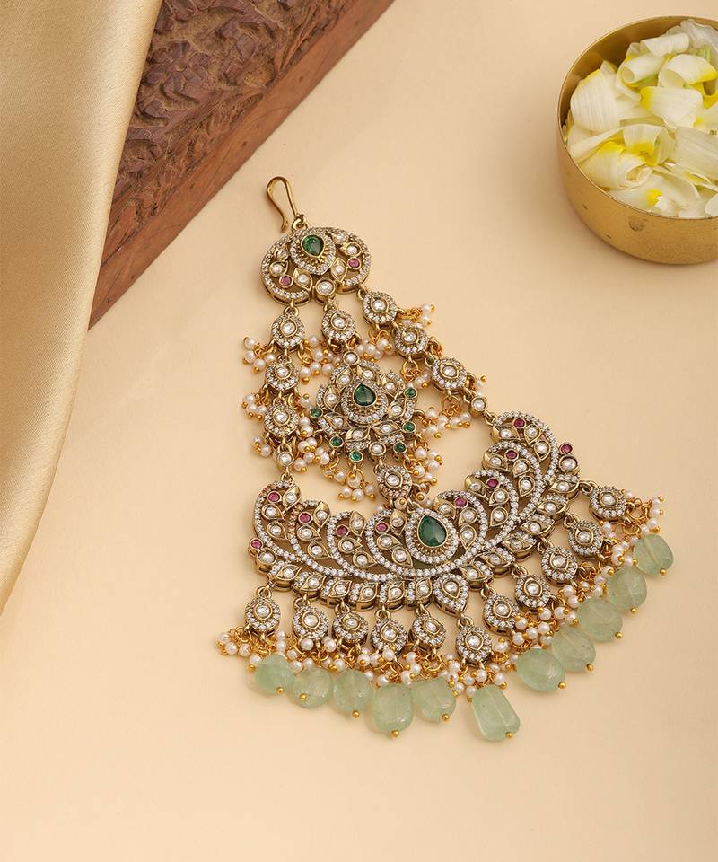 Gold plated kundan green stones passa