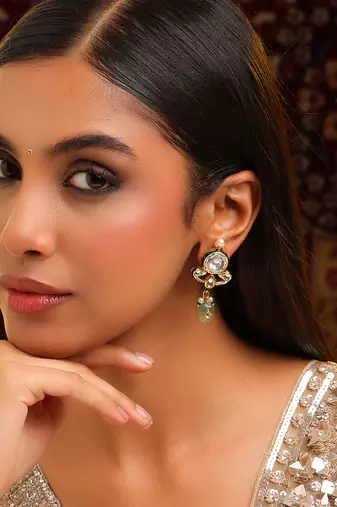 Gold plated kundan green stones earrings