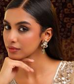 Gold plated kundan green stones earrings