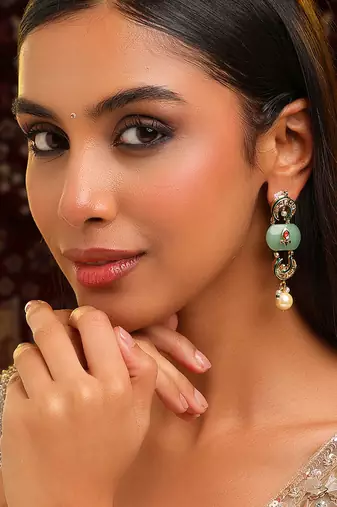 Gold plated kundan green stones earrings