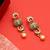 Gold plated kundan green stones earrings