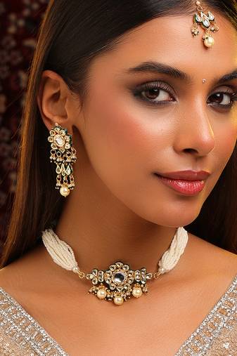 Gold plated kundan green stones choker necklace set with maang tikka