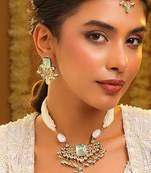 Gold plated kundan green stones necklace set with maang tikka