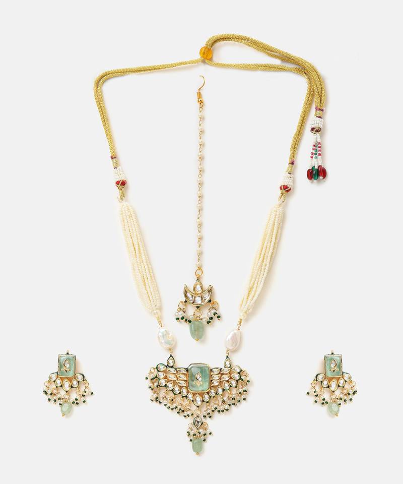Gold plated kundan green stones necklace set with maang tikka